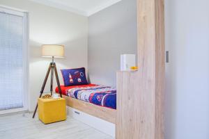 Postel nebo postele na pokoji v ubytování Apartmány a Wellness VMAL