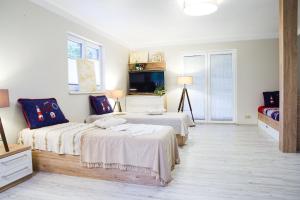 Postel nebo postele na pokoji v ubytování Apartmány a Wellness VMAL