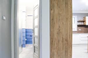Kuchyň nebo kuchyňský kout v ubytování Apartmány a Wellness VMAL