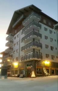 a large building with balconies on the side of it at Apartment Kelotahti in Saariselka