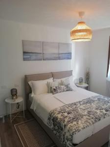 Postel nebo postele na pokoji v ubytování Casa MI-RE-LA