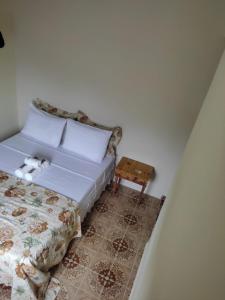 Cama ou camas em um quarto em Pousada Klein