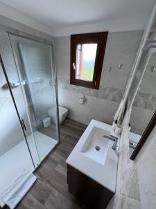 Koupelna v ubytování Casa MI-RE-LA
