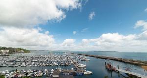 a marina filled with lots of boats on the water at Marina View Brixham in Brixham