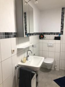 Ένα μπάνιο στο Ferienwohnung Dunja +28 φωτογραφίες