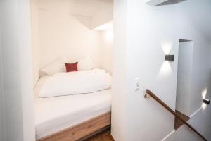 Rúm í herbergi á Kuckuck Hinterthal - Appartements