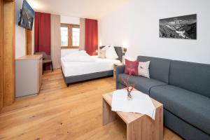 Rúm í herbergi á Kuckuck Hinterthal - Appartements