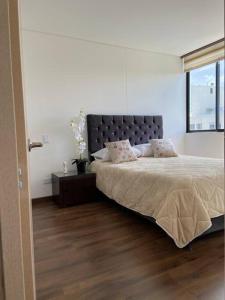 מיטה או מיטות בחדר ב-Apartamento entero para Estrenar - Hermosa Vista.