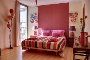 Posteľ alebo postele v izbe v ubytovaní Apartamento Casa Cláudia