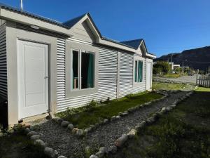 エル・チャルテンにあるApart ALUENの庭隣白屋