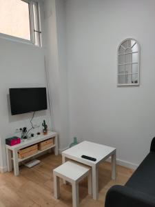 Televízia a/alebo spoločenská miestnosť v ubytovaní Estudio céntrico ARQ