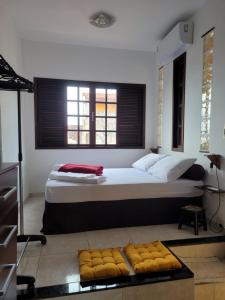Santo Mirante Hostel客房内的一张或多张床位