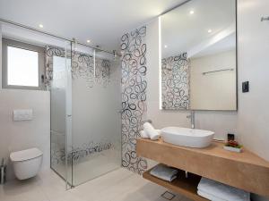 Koupelna v ubytování M City Hotel