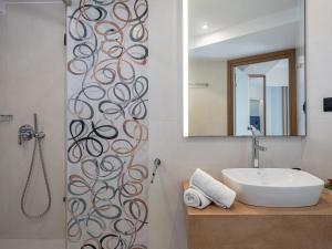 Koupelna v ubytování M City Hotel