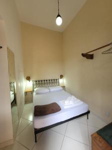 Santo Mirante Hostel客房内的一张或多张床位