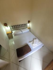 Santo Mirante Hostel客房内的一张或多张床位