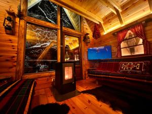 A television and/or entertainment centre at Tara Place - Camp Rabrenovic