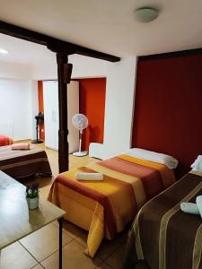Postel nebo postele na pokoji v ubytování Corrala de San Antón. Sencillo apartamento en pleno centro