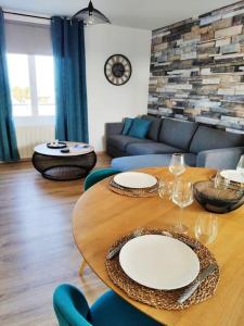 Posedenie v ubytovaní Superbe apt cosy à 500m de la plage pour 4 pers