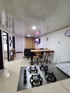 a kitchen with a stove top oven in a room at Casa Horeb in Salento