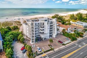 an aerial view of a building next to the beach at Oceana 301 East in St Pete Beach