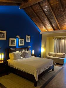 Cama o camas de una habitación en Alta Gracia Parque Hotel