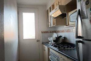 Η κουζίνα ή μικρή κουζίνα στο Departamento Playa Paraiso