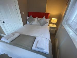 Krevet ili kreveti u jedinici u objektu Grosvenor Place Guest House