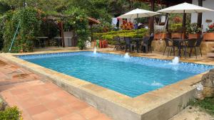 Majoituspaikassa Casa De Campo Villa Caney tai sen lähellä sijaitseva uima-allas