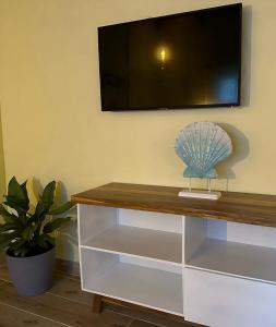 TV a/nebo společenská místnost v ubytování Hotel Villas Gaia Ecolodge
