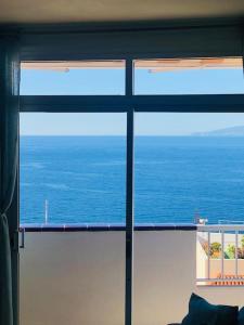 Kép Appartamento con 2 camere da letto vista al mar szállásáról Puerto de Santiagóban a galériában