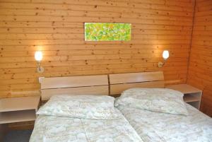 Postel nebo postele na pokoji v ubytování Fortuna