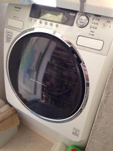 a washing machine with a rainbow in the window at Otsu - House / Vacation STAY 2968 in Otsu
