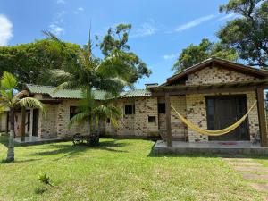 Κήπος έξω από το Haras Trevo de Ferro, Praia, Piscina e Campo