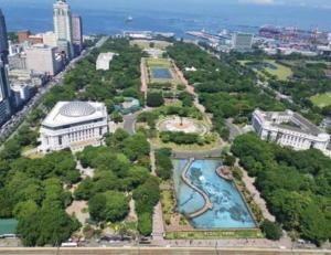 an aerial view of a park with a pool at Manila Condo in front of Rizal Park Taft Ave LRT UN Station Unli WiFi Netflix Disney Youtube by 24K Residences in Manila