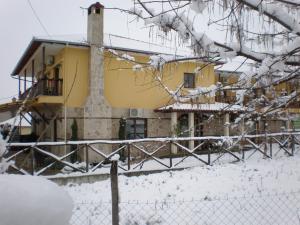 Olympia Guesthouse v zimě