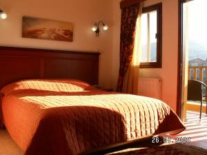 Postel nebo postele na pokoji v ubytování Olympia Guesthouse