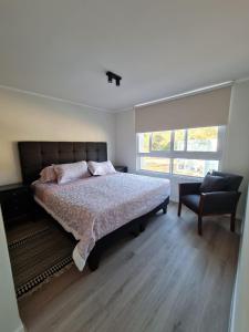 Postel nebo postele na pokoji v ubytování Lomas de Puyai