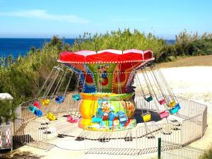 a playground in a cage at the beach at Appartement Six-Fours-les-Plages, 3 pièces, 6 personnes - FR-1-316-122 in Six-Fours-les-Plages
