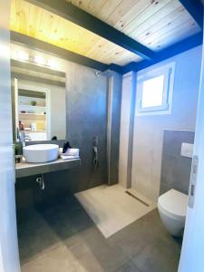 Kúpeľňa v ubytovaní olea resort + 9 fotografií