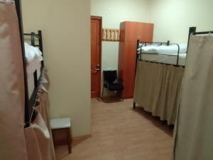 Ein Bett oder Betten in einem Zimmer der Unterkunft Wine Hostel