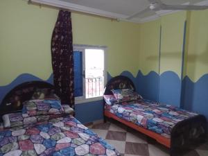 A bed or beds in a room at IKEA Flats