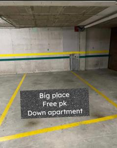a sign that says big place free pig down experiment in a parking garage at SeaHomes Vacations, FENALS BEACH&CHIC, pk, top apartment full equipped in Lloret de Mar