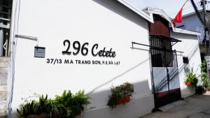 a white building with a sign that reads citi mai tai show at 296 Cetete - Home in Dalat in Da Lat
