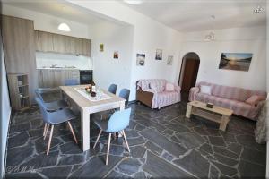 A kitchen or kitchenette at Ampelos apartment and studios Még 19 kép