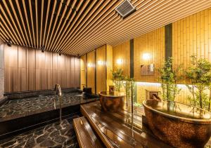 Area soggiorno di APA Hotel & Resort Osaka Umeda Eki Tower