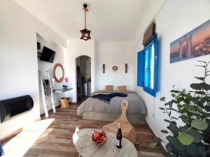 TV a/nebo společenská místnost v ubytování San Constantino Boutique Villa