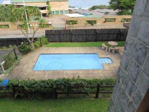 an overhead view of a swimming pool in a yard at Surabaya 21 in Margate