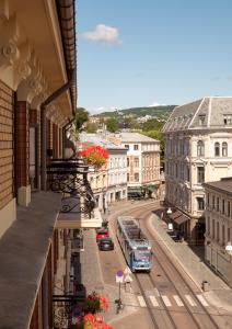 a view of a city with a bus on a street at Cochs Pensjonat in Oslo