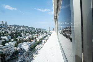 Nespecifikovaný výhled na destinaci Haifa nebo výhled na město při pohledu z hotelu
